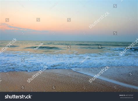 Beautiful Sunrise Beside Beach Ocean Wave Stock Photo 407107537