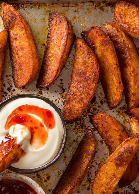 Crunchy Seasoned Baked Potato Wedges Recipetin Eats