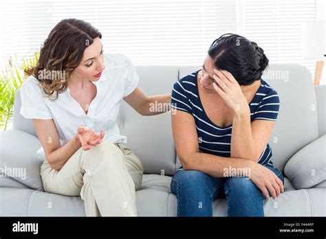 Therapist Comforting Her Patient Stock Photo Alamy