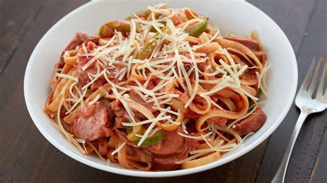 Smoked sausage pasta is pasta mixed with smoked sausage, corn, parmesan cheese, and cajun seasoning, all blended together for a meal that can be ready to serve in under a half an hour! Cajun Pasta with Smoked Sausage Recipe - BettyCrocker.com