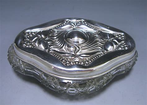 an-art-nouveau-silver-and-glass-dressing-table-jar-1901-thomas-white-bada