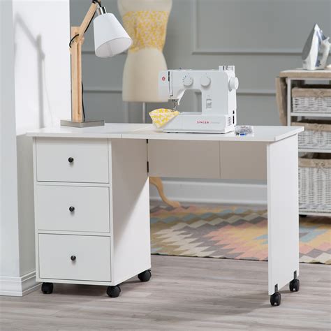You can also consider the design and colour to fit in with your colour scheme and decor. Savannah Folding Mobile Sewing Desk - Sewing Furniture at ...