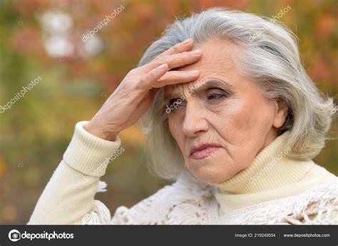 Sad Woman Posing Outdoors Stock Photo By ©aletia 219249554