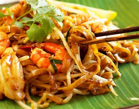Penang 'char kuey teow' is a delicious and popular noodle dish with a smoky flavour and is considered a national favourite of malaysians and singaporeans alike. RojakDaily: Char Kuey Teow ! *yummy*