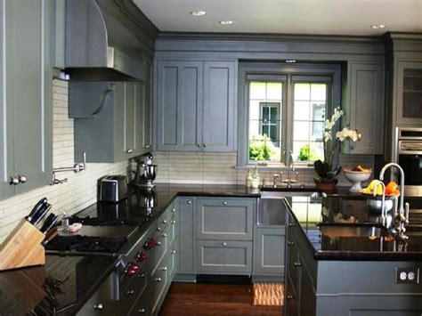 When painting kitchen cabinets, it is important to choose the right color, so here we have pictures of painted kitchen cabinets to help you. Gray Cabinets With Black Countertops | Grey painted ...