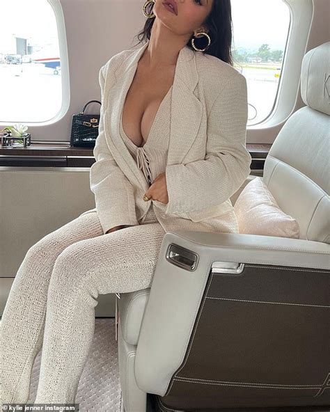 Kylie Jenner Matches A Plunging Knit Top With Business Suit Daily