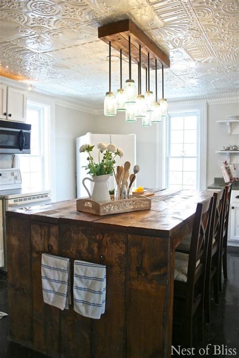 These are faux tin ceiling tiles. DIY Show Off | Tin ceiling kitchen, Kitchen decor, Kitchen ...