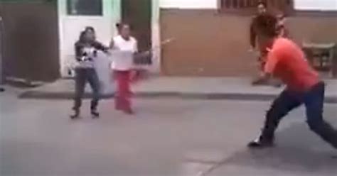 Horrifying Footage Shows Woman Fearlessly Squaring Up To Man During Knife Fight In Broad