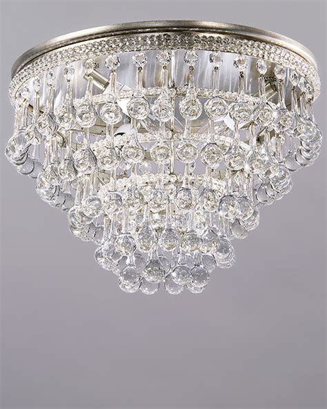 Stylish ceiling light in chrome and glass, with six bulbs centrally positioned within a cascade of chrome and glass. Murano glass ceiling light - the world finest glass ...