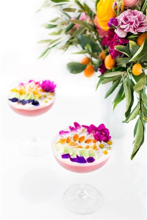 Mini spicy cheesecakes with violas make a lovely dessert. Edible Flower Rainbow Sour Cocktail Recipe | Sugar & Cloth