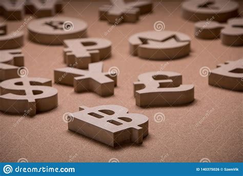 Wooden Sings Or Symbols Of World Currencies In Group Picture Stock