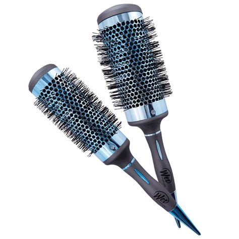 • emits tourmaline for smoother, silkier hair • brush attaches to any magnetic surface • magnetic handle acts as therapy to ease painful and tired wrists • lightweight. Wet Brush Pro Tourmaline Blowout Round Brush