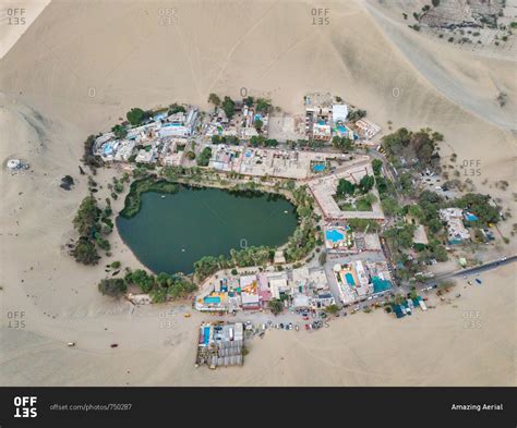 Aerial Close Up Of Huacachina Desert Oasis Resorts And Swimming Pools