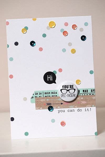 A Close Up Of A Greeting Card With Confetti