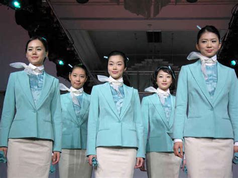 We Rank Flight Attendant Uniforms From Worst To Sexiest Huffpost Life