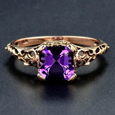 This romantic 14 karat rose gold art deco vintage engagement ring setting design for a round 3/4 carat diamond features graceful filigree openwork. 10 Karat Rose Gold Amethyst Filigree Ring at 1stdibs