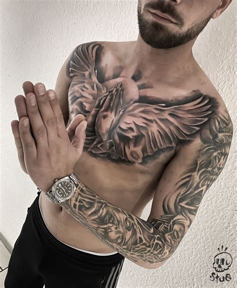 The aftercare for your hand & wrist tattoo is the same as for your fingers. Realistic Chest Tattoo for men / Holy Tattoo / Praying Hands Wing Tattoo / Tattoo idea men ...