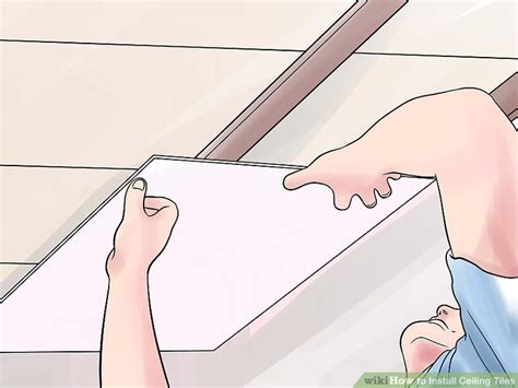 With either method, make sure to measure and cut your tiles to fit around any ceiling fixtures. 3 Ways to Install Ceiling Tiles - wikiHow