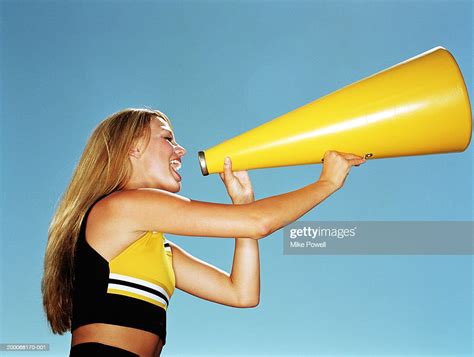Cheerleader Yelling Through Megaphone Low Angle Side View Stock Foto Getty Images