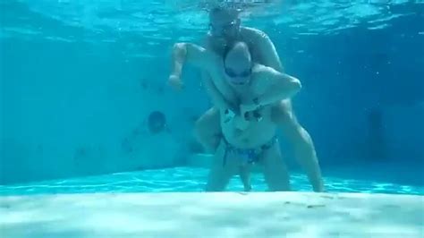 Underwater Fight In Bulging Speedos