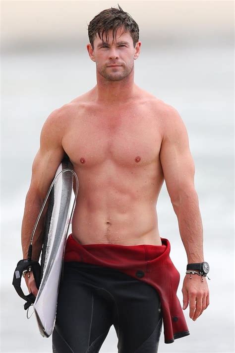 chris hemsworth s beach pda with elsa pataky is cute but holy hell wait until you see his abs