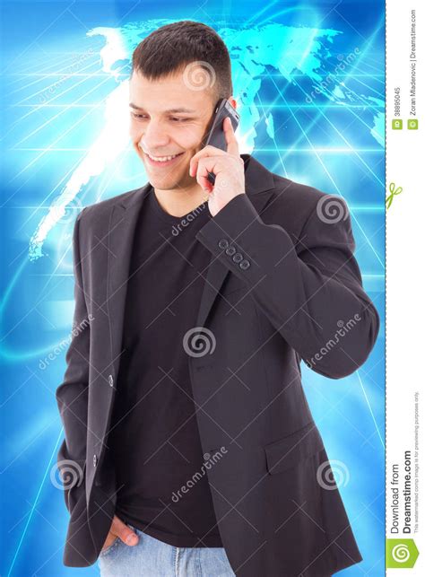 Casual Man In A Suit Talking Over Mobile And Smiling Stock Image