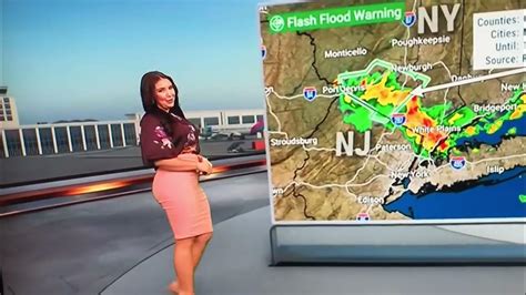 Felicia Combs Of The Weather Channel Giving That Pink Skirt All It Can