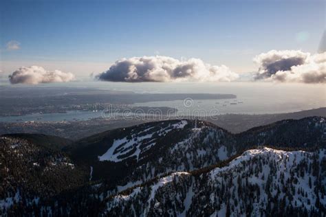 Grouse Mountain With Vancouver Downtown In Background Stock Image