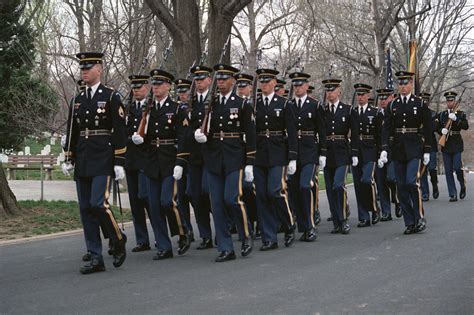 An Honor Guard From The Army 3rd Infantry The Old Guard Marches With