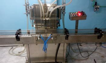 semi automatic flavored milk filling machines  head  head filling machinery thane india