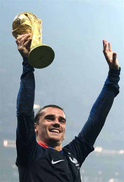 Antoine Griezmann Of France Lifts The World Cup Trophy Following The