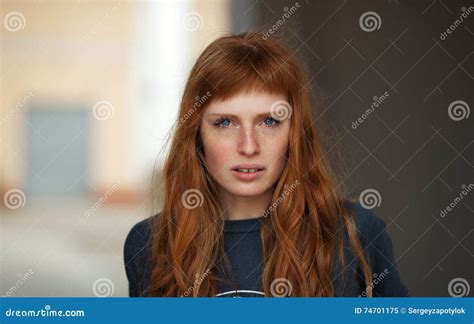 Young Redhead Caucasian Woman Serious Face Outdoor Portrait Stock Image