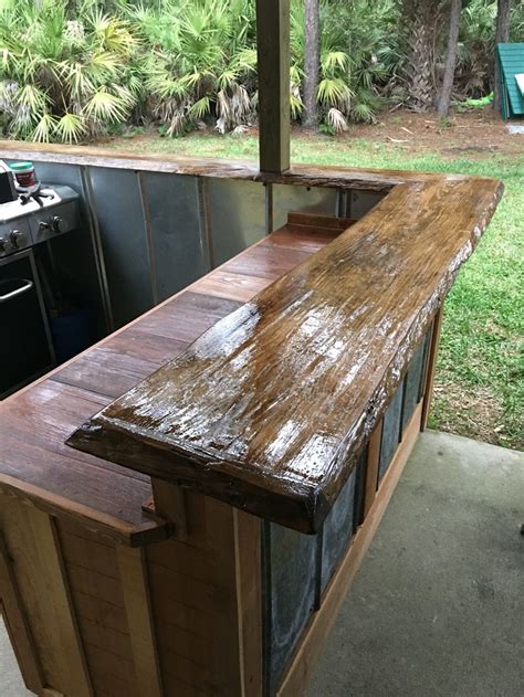 A home is more than just a house, and decor is more than just furnishings. Live edge bar top | Diy outdoor bar, Live edge dining ...
