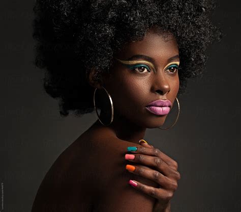 African Woman With Colourful Make Up By Stocksy Contributor Lumina