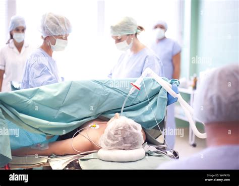 Team Surgeon At Work In Operating Room Stock Photo Alamy