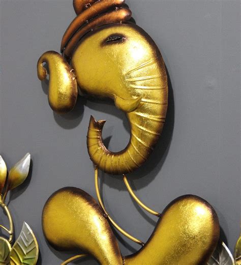 Buy Iron Lord Ganesha Wall Art In Gold By Malik Design Online