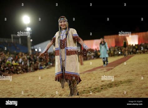 an indigenous woman participates in a parade called international indigenous beauty during the