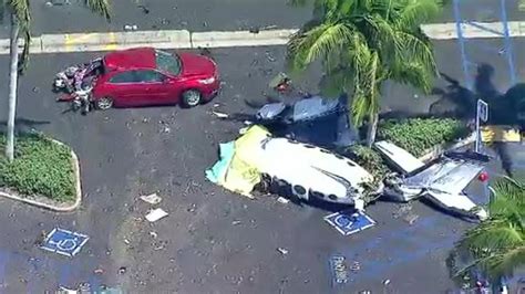 5 Killed When Small Plane Crashes In Parking Lot