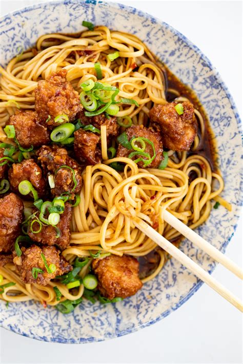 With motor running, add boiling water until dough forms ball. Crispy Pork with Saucy Spicy Noodles - Simply Delicious