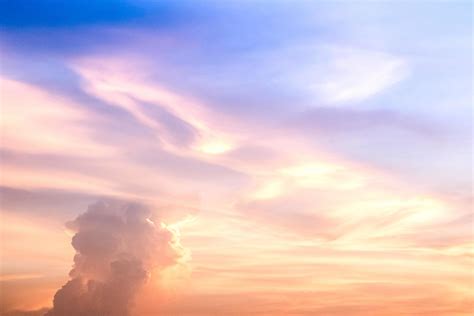 Sunset Sky Clouds In The Evening On Golden Hour With Orange Sunlight