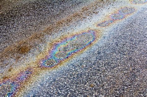 Oil Spill On Asphalt Road As Texture Or Stock Image Colourbox