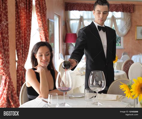 Waiter Serving Some Image And Photo Free Trial Bigstock