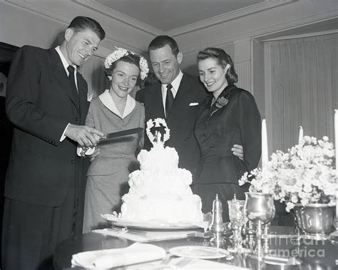 ronald and nancy reagan slicing wedding photograph by bettmann pixels