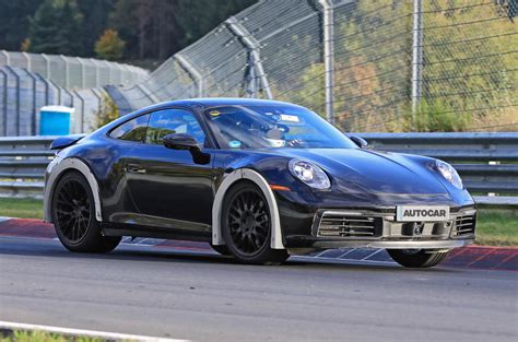 High-riding Porsche 911 prototype hints at rally-inspired variant | Autocar