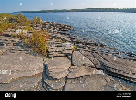 Weathered Rocks and Water on the Great Lakes Shore in Lake Huron in