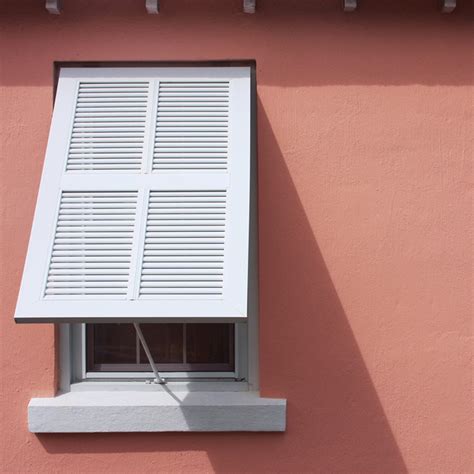 Insert hanger bolts into each hole. Severe Weather: Shutters for Doors and Windows | The Family Handyman