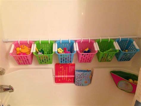 Extra storage in your shower and throughout your for large families with small bathrooms, keeping the kids' stuff together can be a storage struggle. Great idea for bathtub toy storage! | Kiddlets | Pinterest
