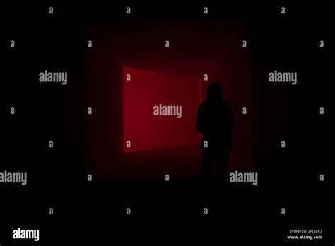 Shadowy Figure On The Dark Background With Red Light Stock Photo Alamy