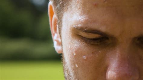 Epic Extreme Close Up Shot Of Sweaty Man Outdoor In Park Drop Of Water