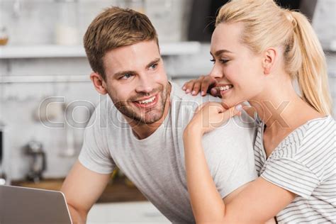 Smiling Girlfriend Hugging Boyfriend In Stock Image Colourbox